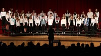 students singing in district choral concert