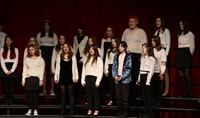 students singing in district choral concert