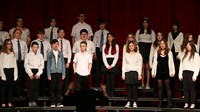 students singing in district choral concert