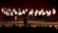 students singing in district choral concert