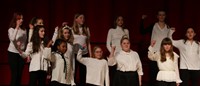 students singing in district choral concert