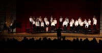 students singing in district choral concert
