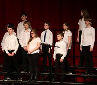 students singing in district choral concert