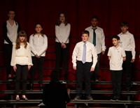 students singing in district choral concert