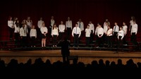 students singing in district choral concert