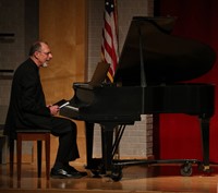 pianists playing piano