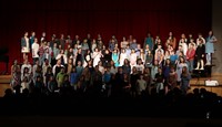 students singing in district choral concert