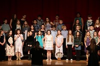 students singing in district choral concert