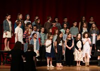 students singing in district choral concert