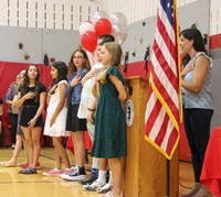 people at fifth grade graduation ceremony