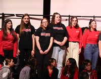 students singing in choral concert