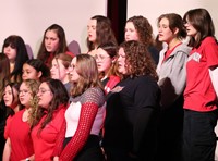 students singing in choral concert