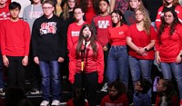 students singing in choral concert