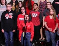 students singing in choral concert