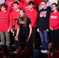 students singing in choral concert