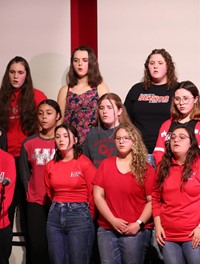 students singing in choral concert