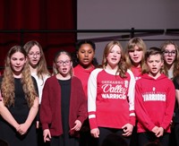 students singing in choral concert