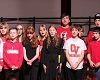 students singing in choral concert