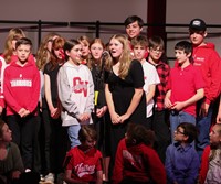 students singing in choral concert