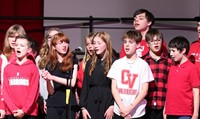 students singing in choral concert