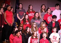 students singing in choral concert