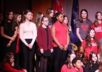 students singing in choral concert