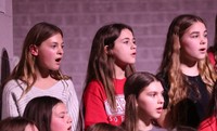 students singing in choral concert