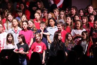 students singing in choral concert