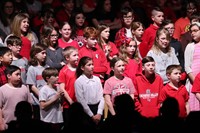 students singing in choral concert