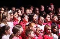 students singing in choral concert