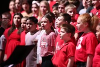 students singing in choral concert