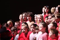 students singing in choral concert