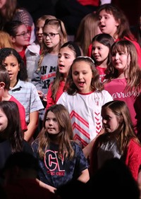 students singing in choral concert