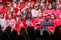 students singing in choral concert