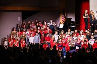 students singing in choral concert