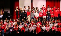 students singing in choral concert