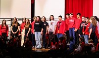 students singing in choral concert