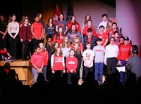 students singing in choral concert