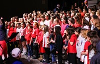 students singing in choral concert