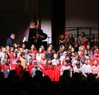 students singing in choral concert