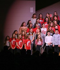 students singing in choral concert