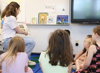 11th graders reading to Port Dickinson Elementary students