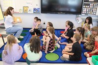 11th graders reading to Port Dickinson Elementary students