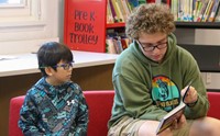 11th graders reading to Port Dickinson Elementary students