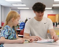 11th graders reading to Port Dickinson Elementary students