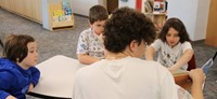 11th graders reading to Port Dickinson Elementary students