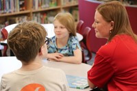 11th graders reading to Port Dickinson Elementary students
