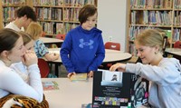 11th graders reading to Port Dickinson Elementary students