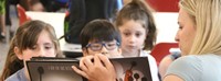 11th graders reading to Port Dickinson Elementary students