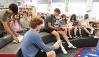 11th graders reading to Port Dickinson Elementary students